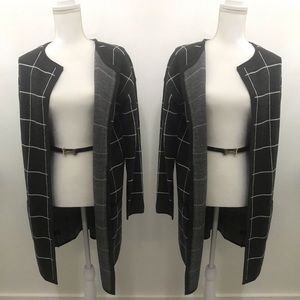 The limited NWT long black cardigan